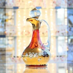 Karaffe & Dekanter^Art Glass Flasche mit Verschluss Red Queen 750 ml, Rot/Gold, aus Glas