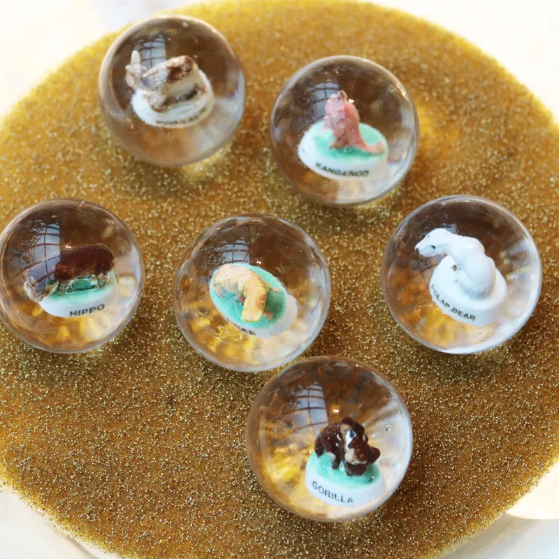 Nuggets & Murmeln^Cristalica Kingdom Murmeln mit Tierfiguren (30mm)